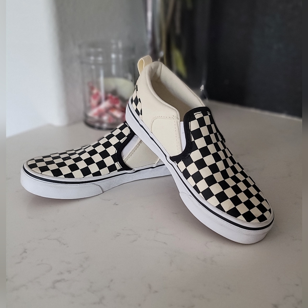 Vans Black and White Checkerboard Slip-On Sneakers